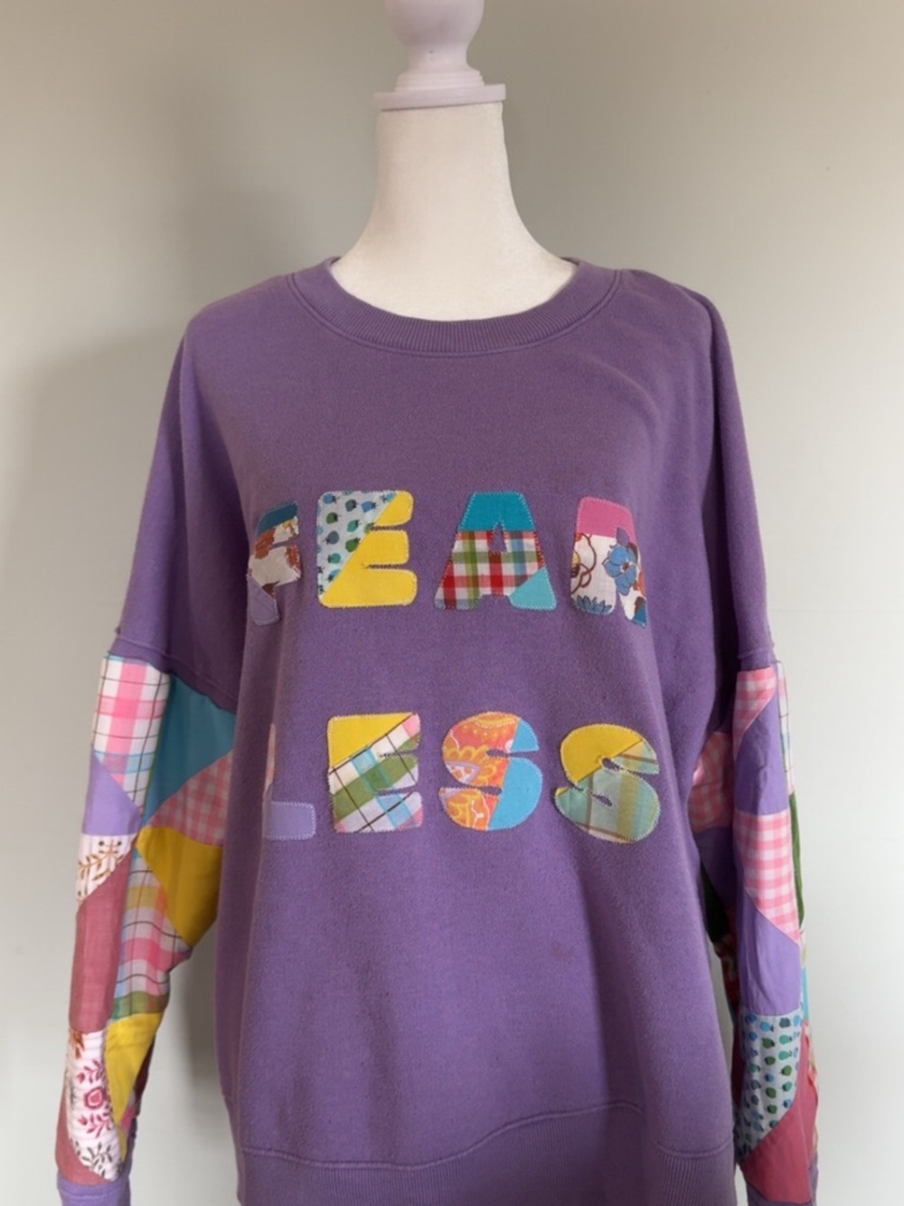 Purple Patchwork 'Fear Less' Appliqué Sweatshirt